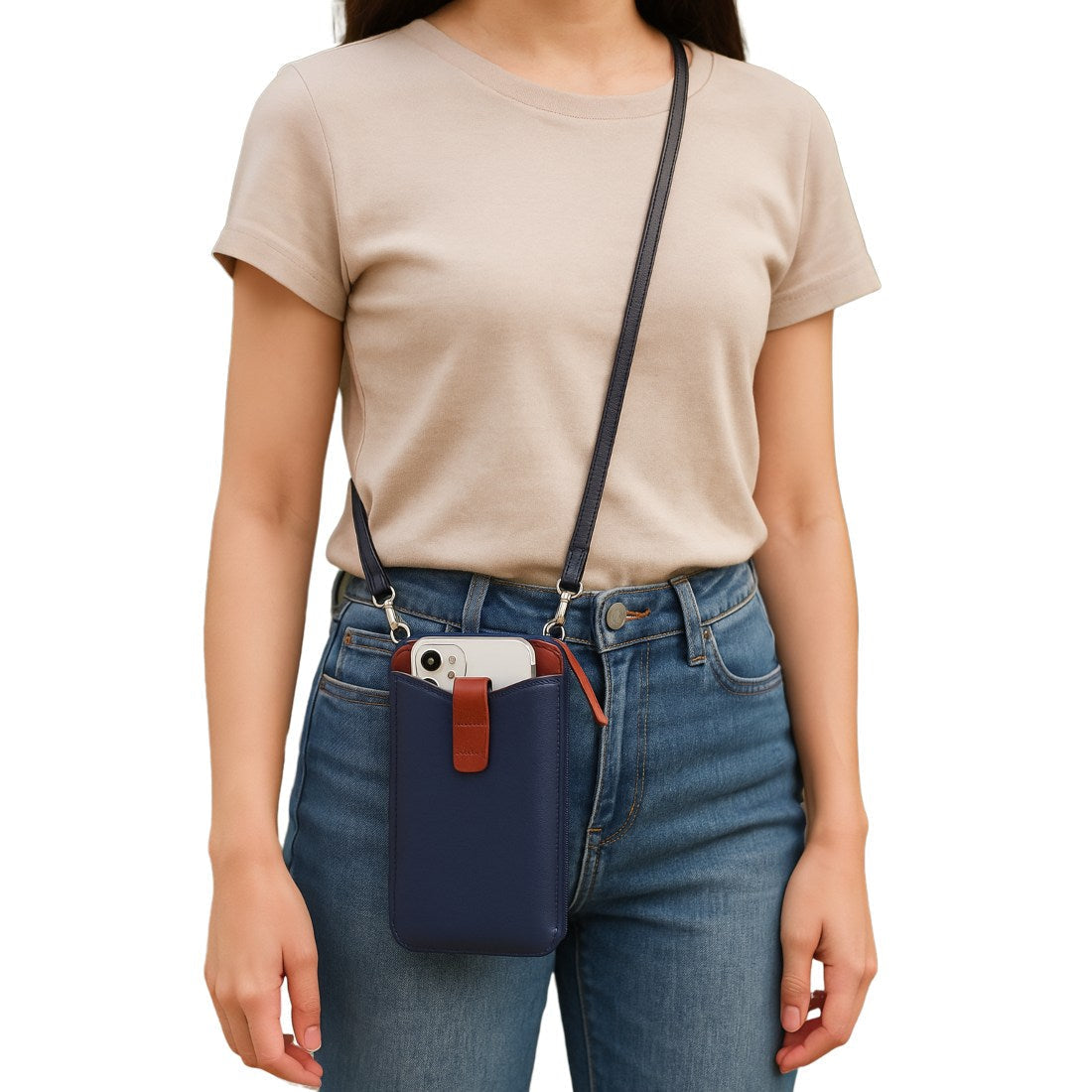 City Snap Carry durable compact upscale crossbody bag in navy genuine leather with brown snap closure shown on model wearing casual outfit