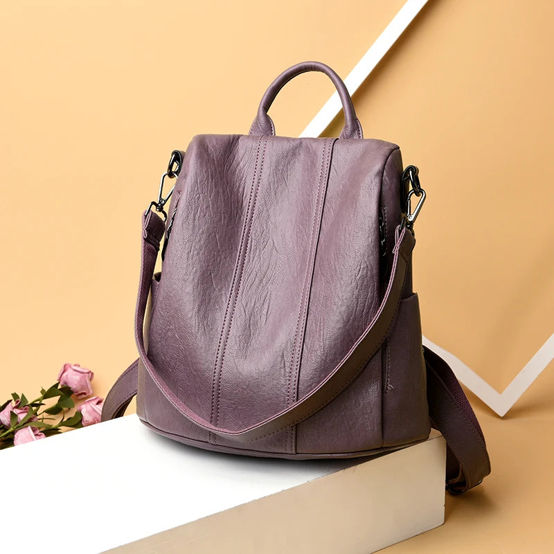 Urban Ease Backpack women’s vegan leather tote bag in mauve with top handle and shoulder strap with silver hardware