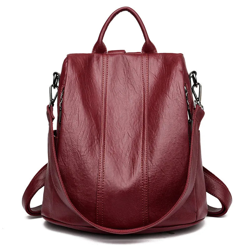 Urban Ease Backpack women’s vegan leather backpack with silver hardware in burgundy with top handle and shoulder straps