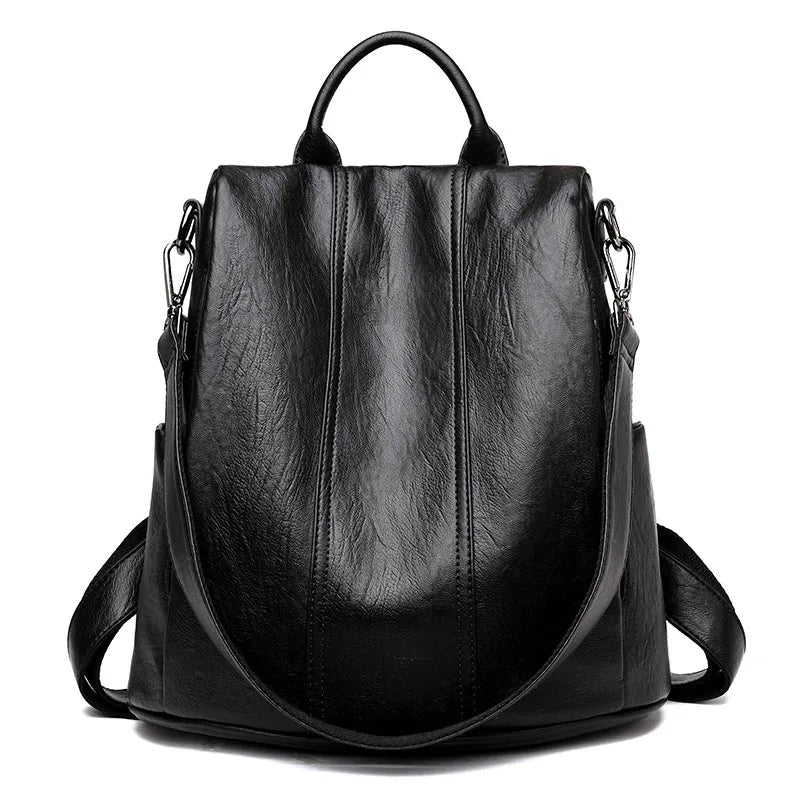 Urban Ease Backpack women’s black vegan leather backpack-style tote with silver hardware with top handle and shoulder straps