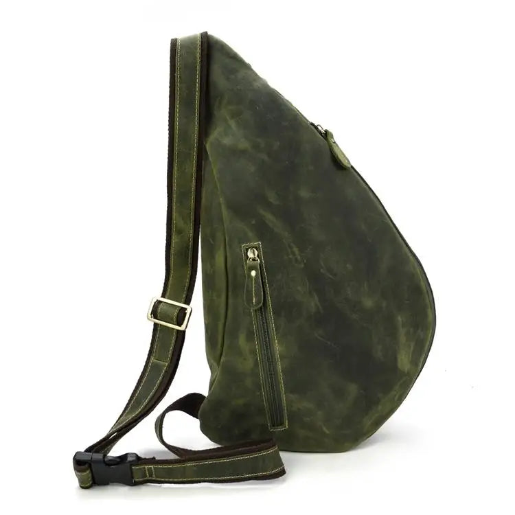 Heritage Nomad Sling men's sling bag in green leather with adjustable shoulder strap and side zipper pocket