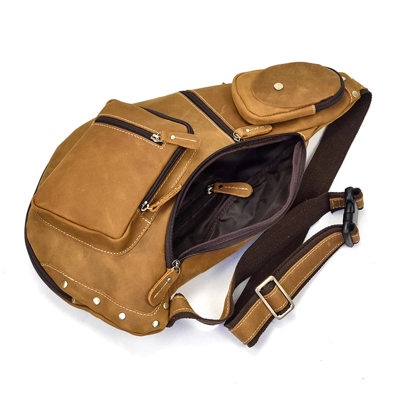 Heritage Nomad Sling men's crossbody bag, brown leather, multiple zip compartments, coin pouch and adjustable strap