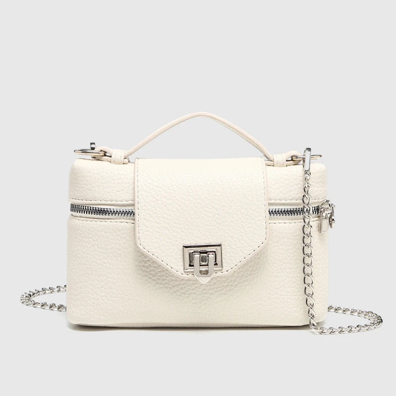 Timeless Petite Luxe women’s white vegan leather crossbody bag with silver chain strap