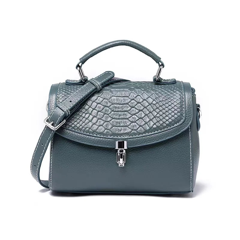 Luxe  Croc  Carry in blue croc-embossed genuine leather upscale women’s clutch with detachable adjustable strap