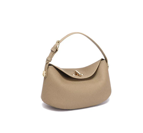 Timeless Arc Tote in taupe real leather angled side view luxury tote