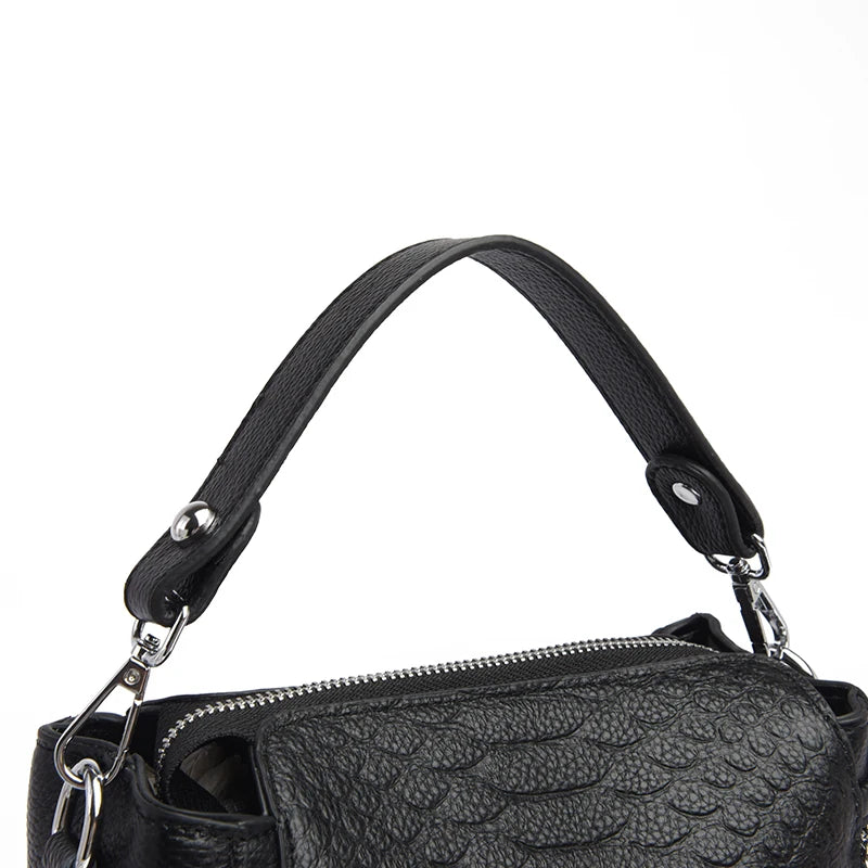 Timeless Zip Carry women’s black textured leather shoulder bag with short handle and zipper