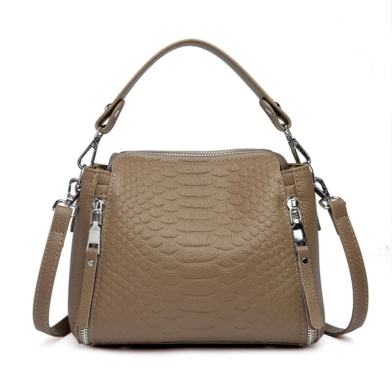 Timeless Zip Carry women's taupe genuine leather crossbody bag with textured pattern and top handle