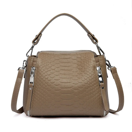Timeless Zip Carry women's taupe genuine leather crossbody bag with textured pattern and top handle