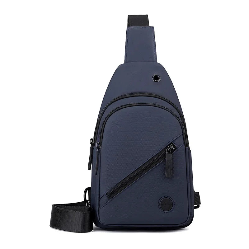 Active Axis Crossbody in blue shown upright, durable upscale nylon crossbody bag with smart organization and versatile spacious design