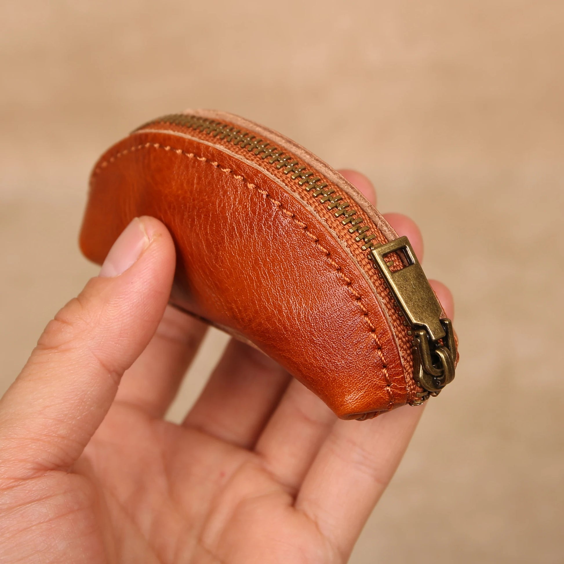 heritage key case in hand compact leather key holder