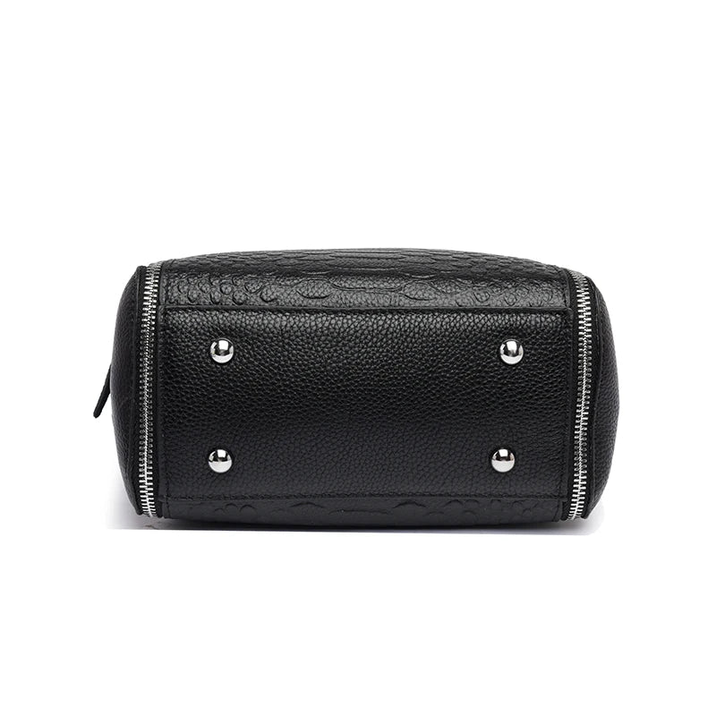 Timeless Zip Carry women’s black leather tote bag with textured finish and silver hardware, bottom view