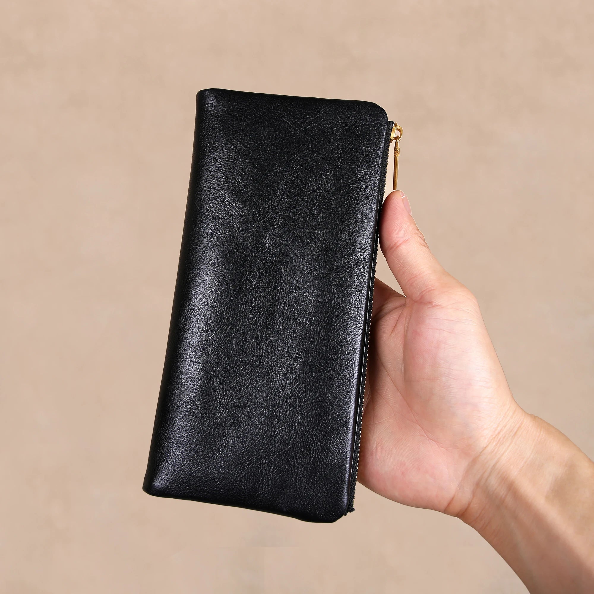black leather bag long zip wallet front view