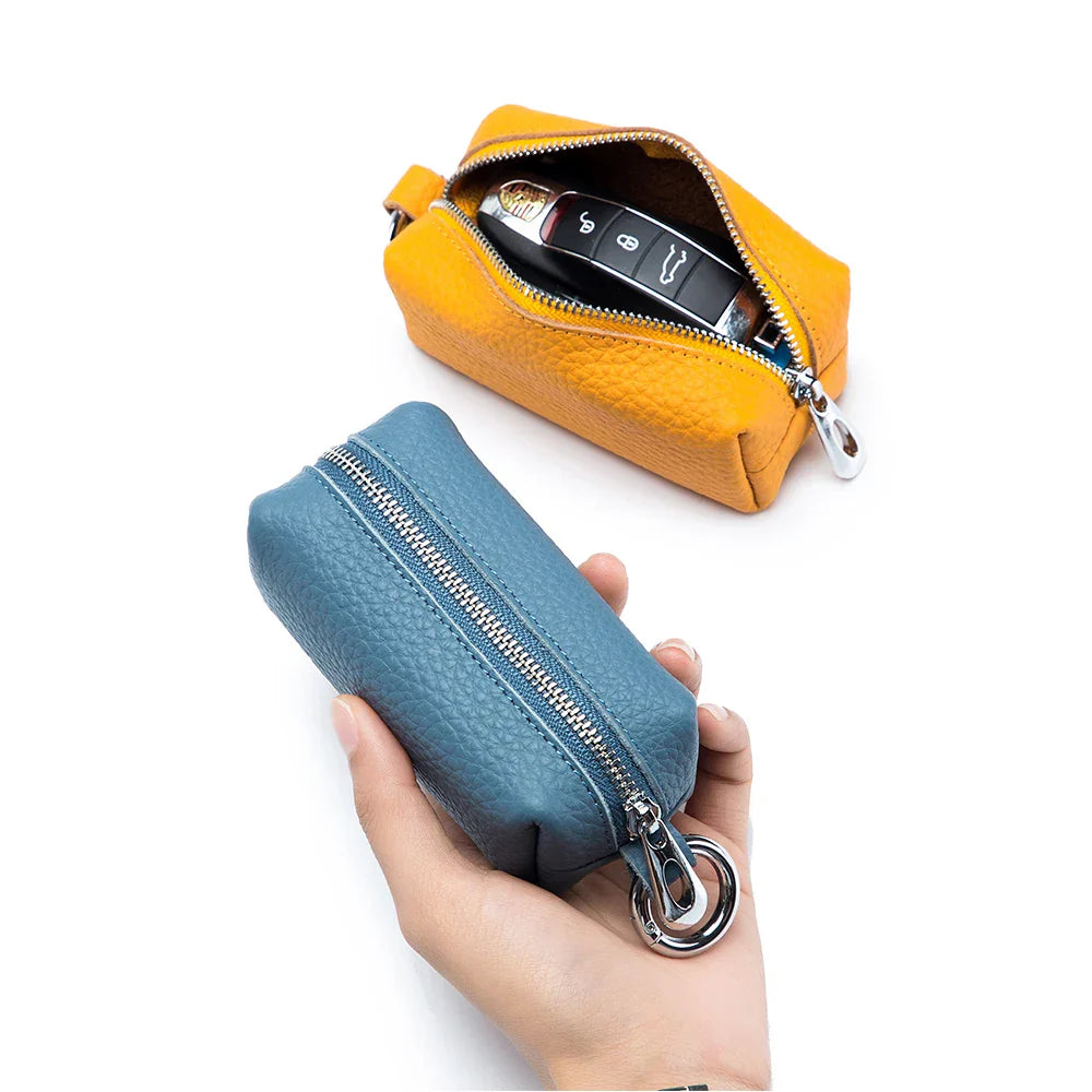 yellow pocket trio interior dual key chains and blue leather clutch for a leather crossbody bag