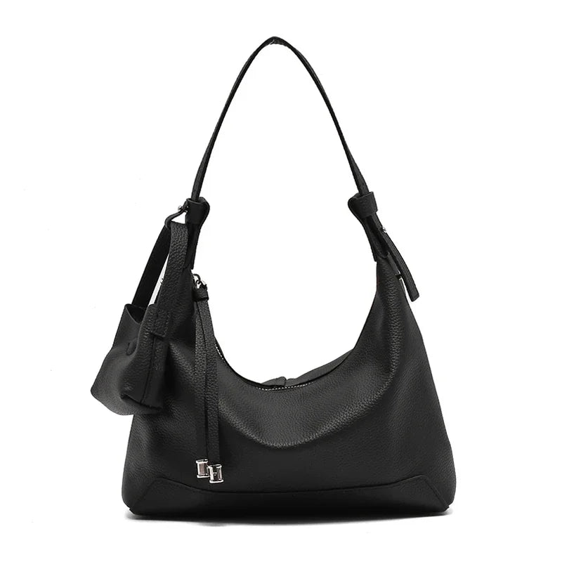 Metro Leather Hobo women's black leather shoulder bag with textured finish and zip closure and silver hardware