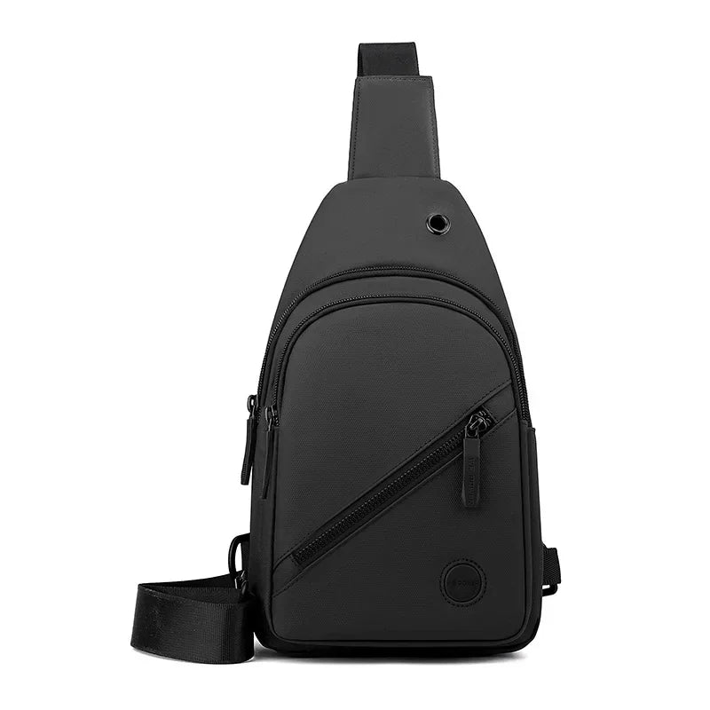 Active Axis Crossbody in blue shown upright, durable upscale nylon crossbody bag with smart organization and versatile spacious design