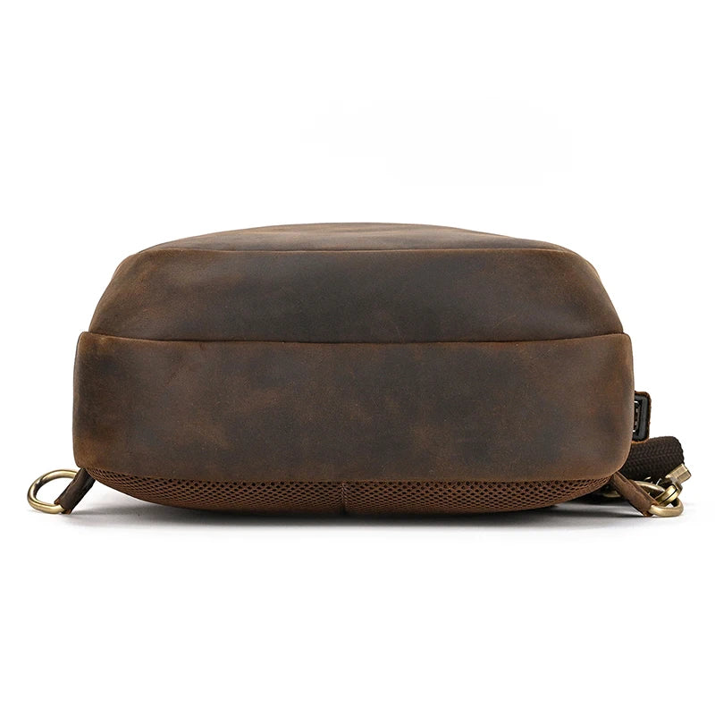 Frontier Leather Sling men’s crossbody bag in brown crazy horse leather with adjustable strap and mesh bottom detail