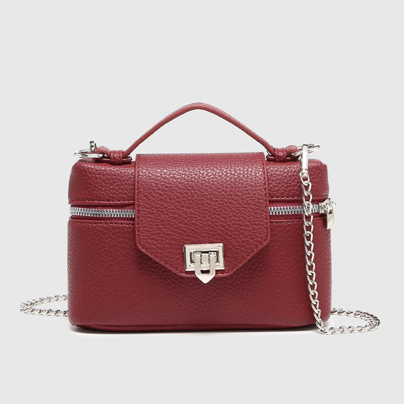 Timeless Petite Luxe women’s burgundy pebbled vegan leather crossbody bag with silver chain strap and top handle