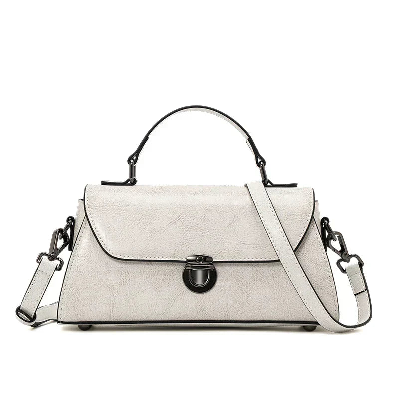 Metro Fold Carry premium black luxury leather compact tote with silver hasp buckle