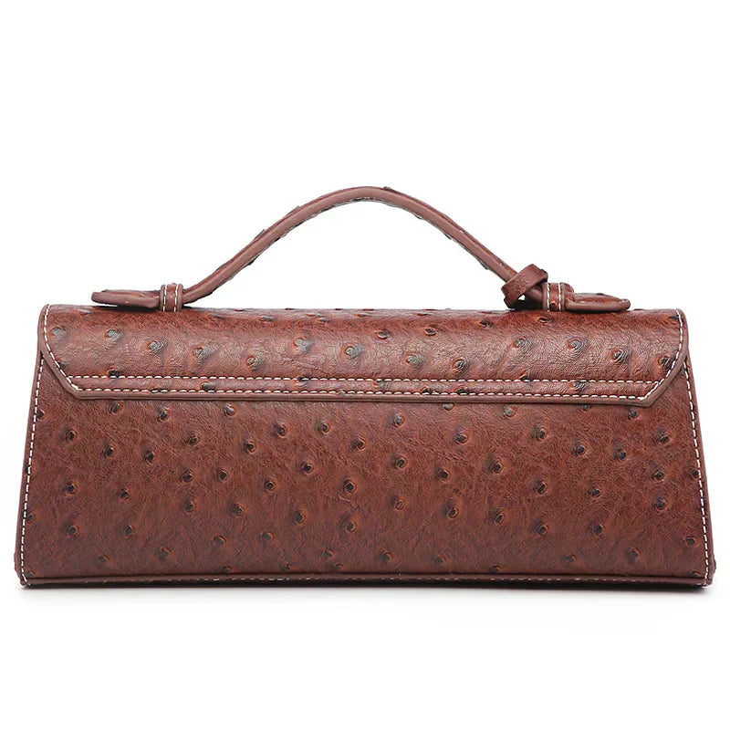 Timeless Elle Petite upscale crossbody bag in brown ostrich texture back view with strap