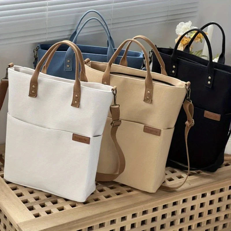 Timeless Canvas Carry tote bags in beige khaki blue black upscale durable canvas design with genuine leather handles and crossbody straps