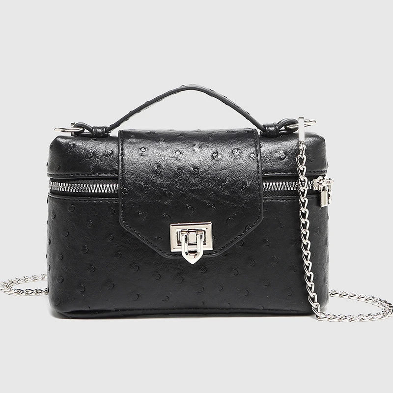 Timeless Petite Luxe women’s black textured vegan leather crossbody bag with top handle and chain strap