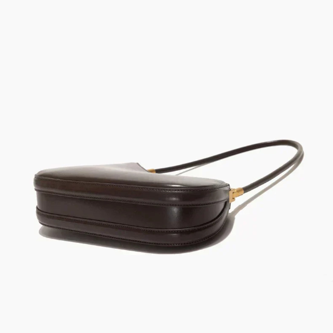 Timeless Arc Carry luxury genuine leather handbag in brown angled side view
