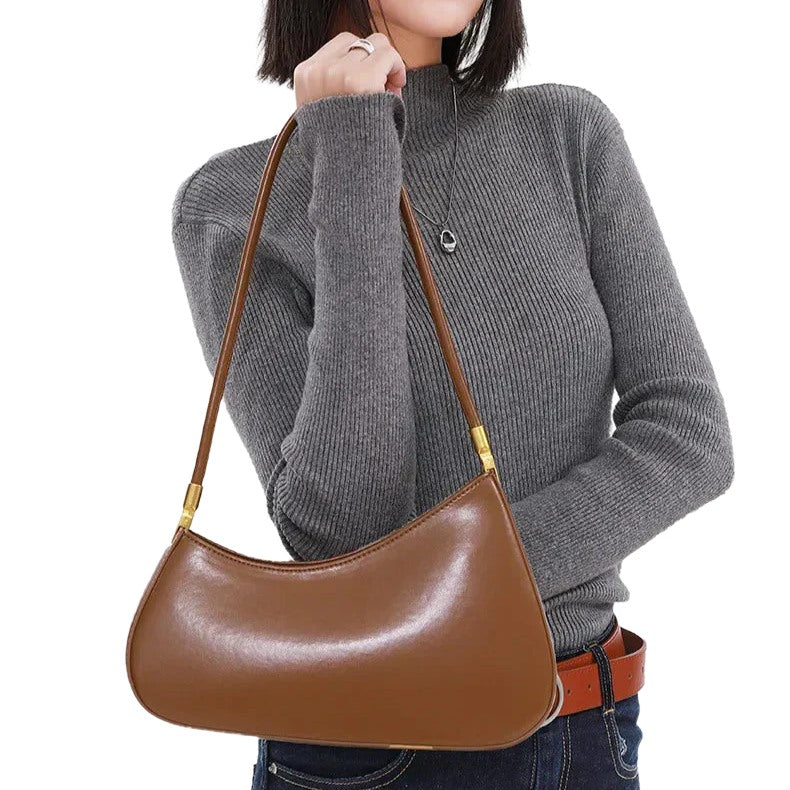 Timeless Arc Carry luxury upscale caramel leather bag styled on shoulder