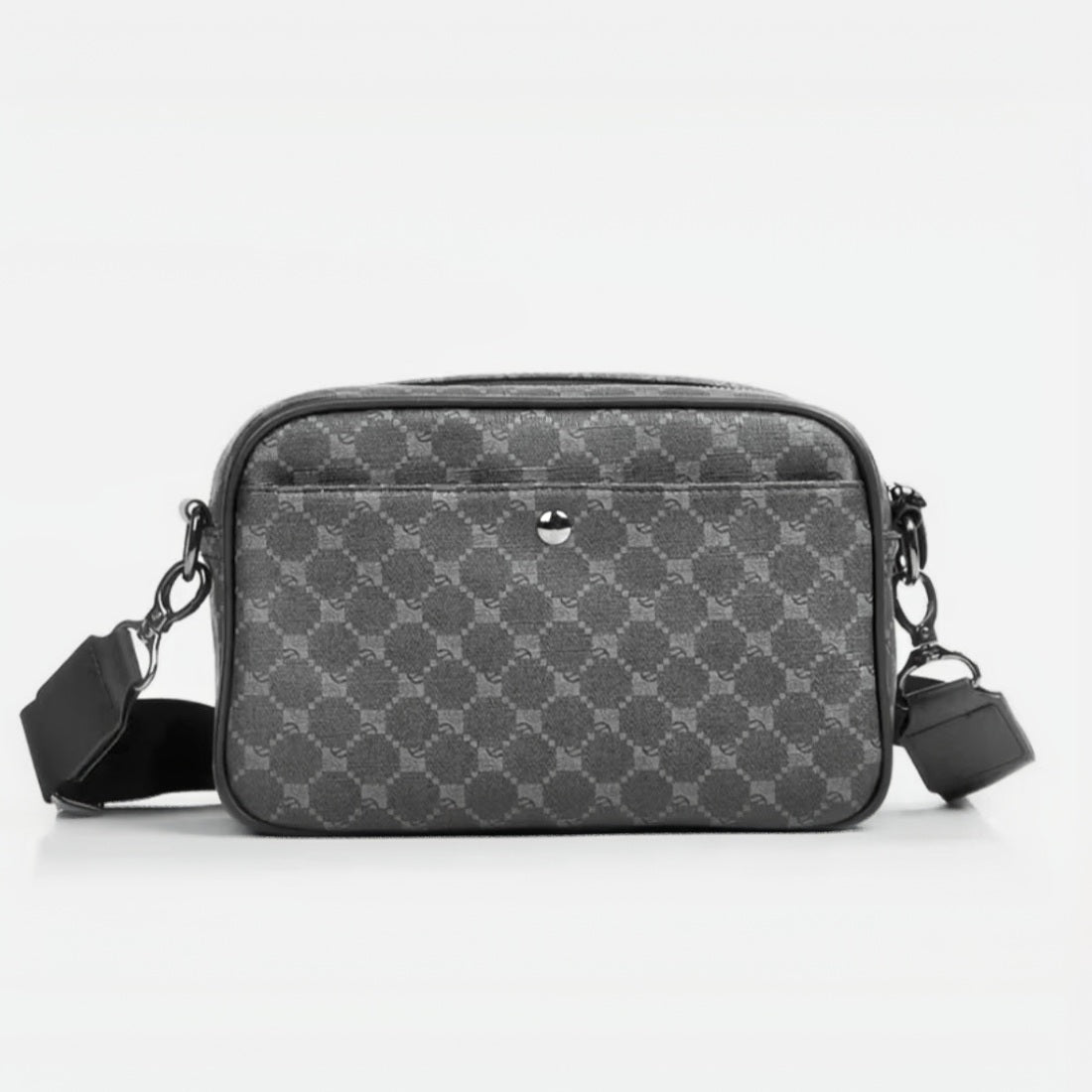 Urban Axis Crossbody back in black vegan leather with geometric patterned panel featuring zippered main compartment front zip pocket and adjustable strap with metal clasps showcasing back snap closure pocket and sleek silhouette and refined urban styling
