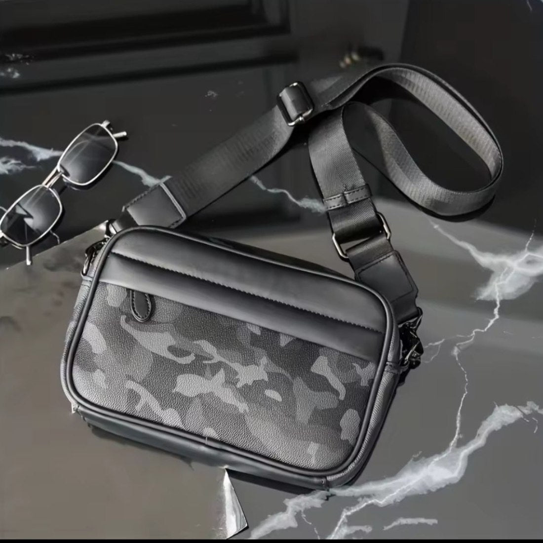 Urban Axis Crossbody in camouflage waterproof vegan leather with zippered compartments detachable adjustable strap and rectangular silhouette showcasing bold street style and versatile everyday durable functionality