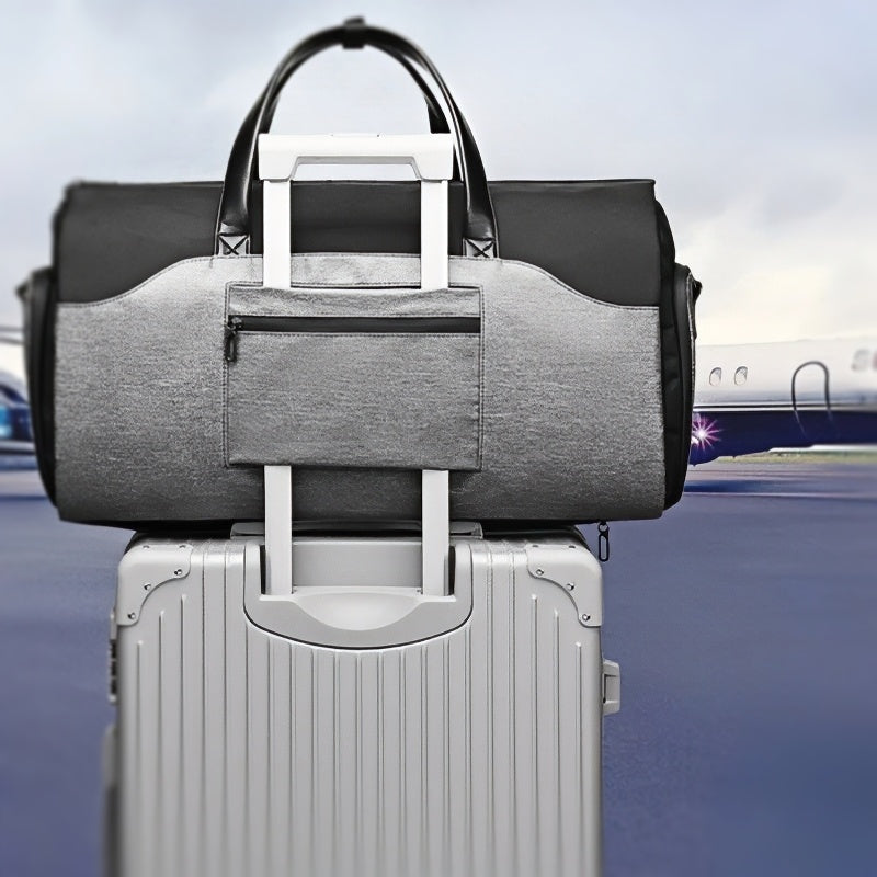 waterproof durable spacious axis travel companion mens duffle bag on top of suitcase for travel
