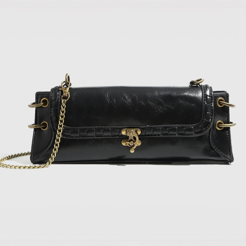 Luxe Chain Carry women's black vegan leather clutch with brass chain strap and clasp
