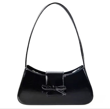 Timeless Bow Carry women's black vegan leather shoulder bag with bow detail and glossy finish