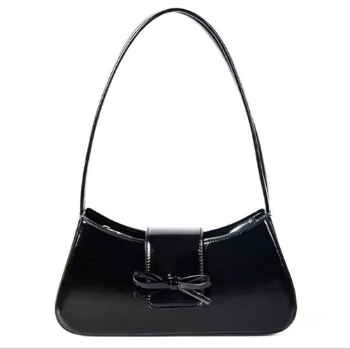 Timeless Bow Carry women's black vegan leather shoulder bag with bow detail and glossy finish