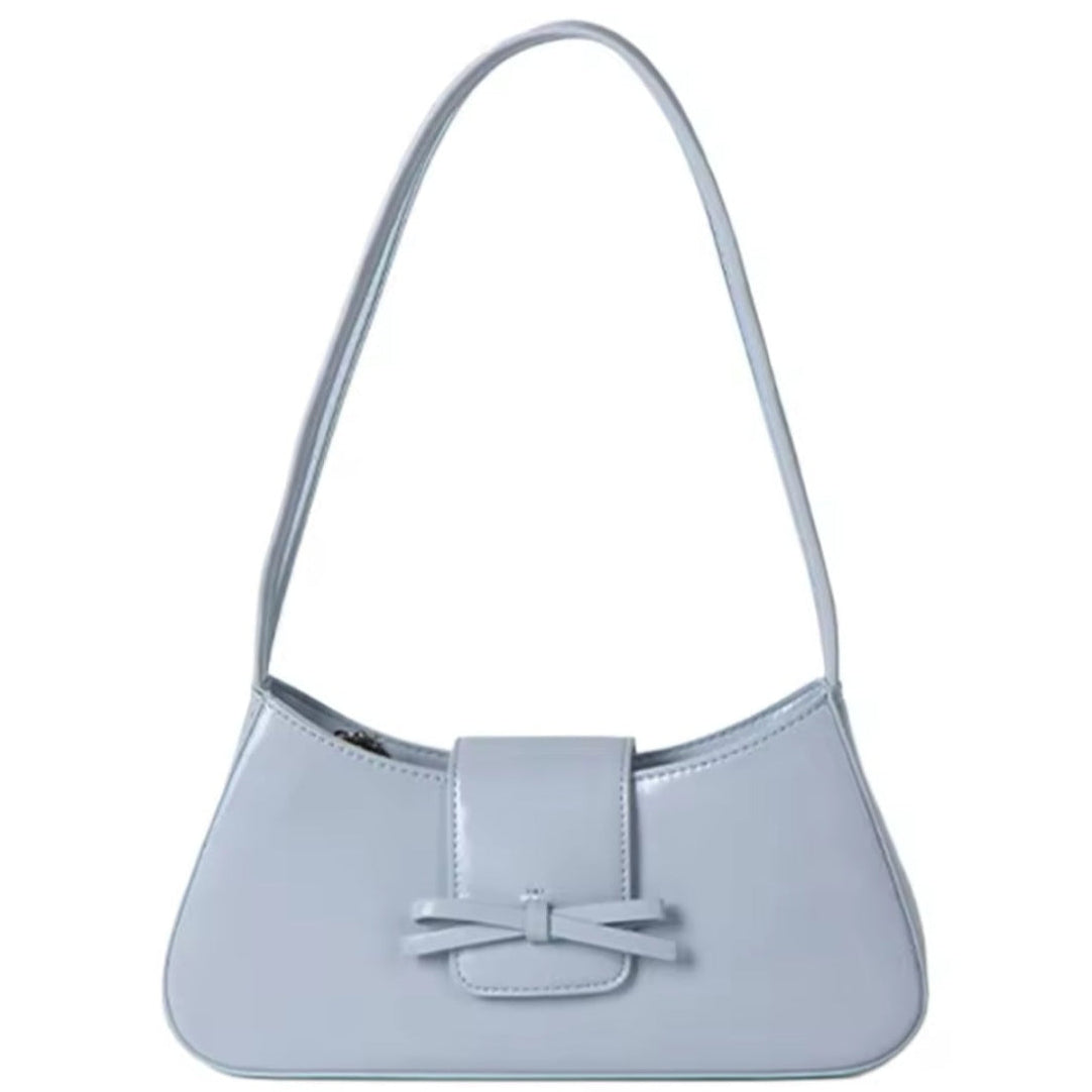 Timeless Bow Carry blue luxury vegan leather purse stylish compact silhouette with bow accent