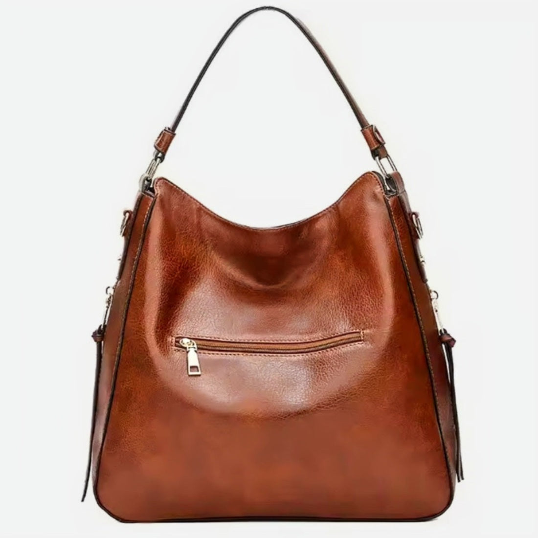 Classic Carry Hobo back view in brown premium vegan leather with relaxed crescent silhouette single shoulder strap and smooth finish showcasing soft texture upscale detailing and luxury timeless everyday styling
