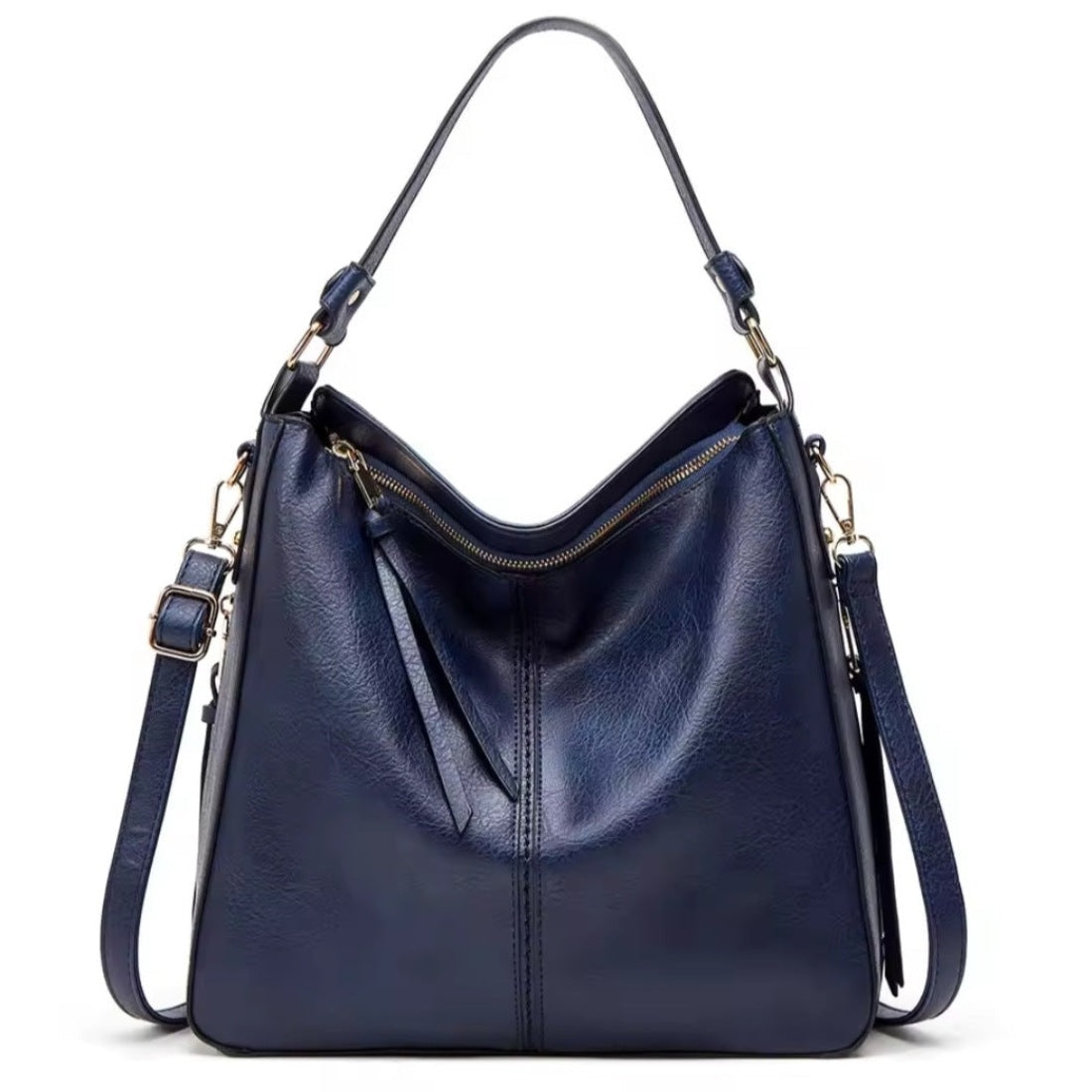 Classic Carry Hobo in blue premium vegan luxury leather with relaxed crescent silhouette single top handle adjustable detachable shoulder strap and zippered main compartment showcasing soft texture upscale detailing spacious interior and versatile everyday design