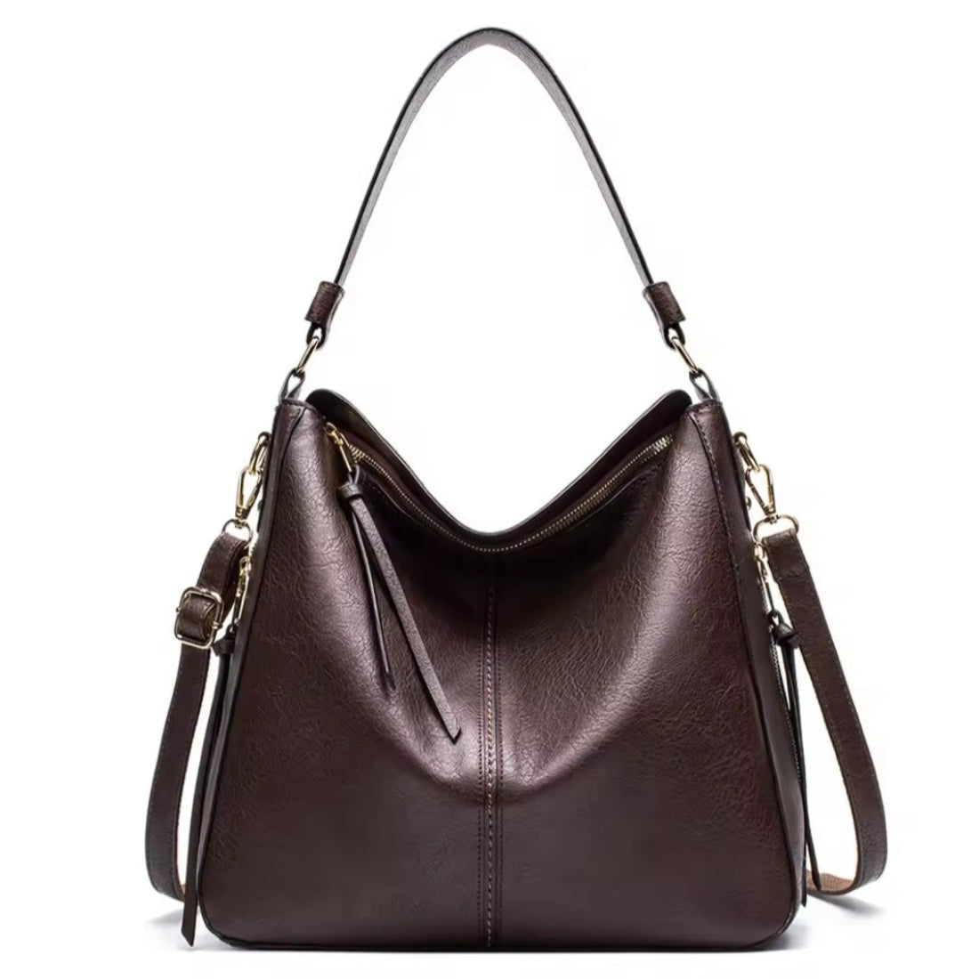 Classic Carry Hobo in chocolate premium vegan leather with relaxed crescent silhouette single top handle adjustable detachable shoulder strap and zippered main compartment showcasing soft texture upscale detailing spacious interior and versatile luxury everyday design