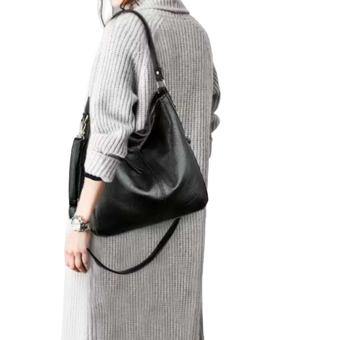 Classic Carry Hobo in black premium vegan leather with elegant relaxed crescent silhouette single shoulder strap and slouchy structure worn by model showcasing effortless styling upscale craftsmanship and versatile everyday luxury durable design