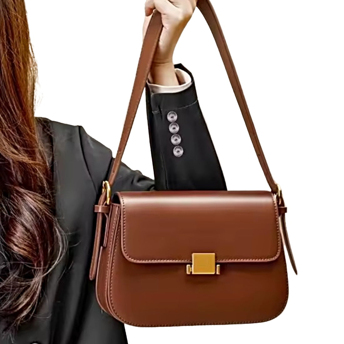 Timeless Charm Satchel in caramel luxury genuine kitt cross grain leather with structured rectangular silhouette flap front design gold accent hasp closure and single shoulder strap held by model showcasing luxury styling upscale craftsmanship premium finish and compact everyday sophistication