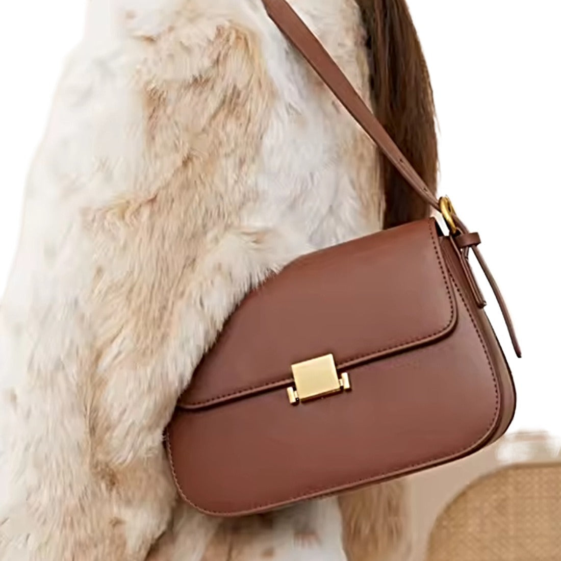 Timeless Charm Satchel in caramel genuine kitt cross grain leather with structured rectangular silhouette flap front design gold accent hasp closure and matching shoulder strap worn by model showcasing luxury styling upscale craftsmanship premium finish and compact everyday sophistication