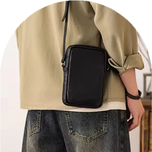 Homepage Metroline Carry black compact upscale luxury leather crossbody worn over shoulder