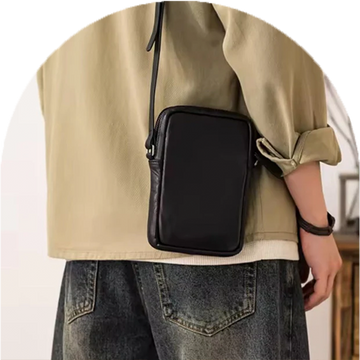 Homepage Metroline Carry black compact upscale luxury leather crossbody worn over shoulder