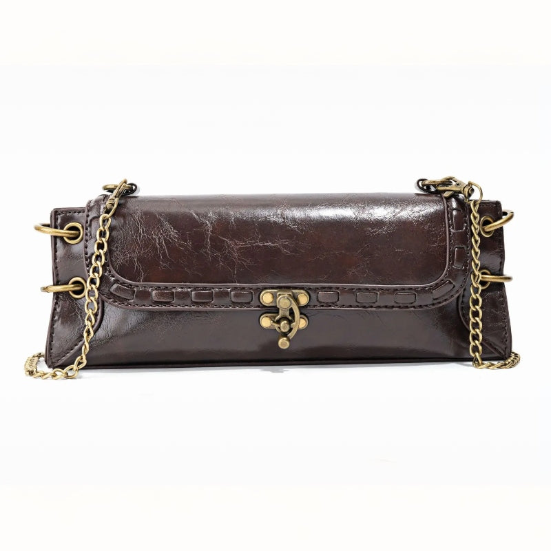 Luxe Chain Carry women's brown vegan leather clutch bag with brass chain strap and clasp closure