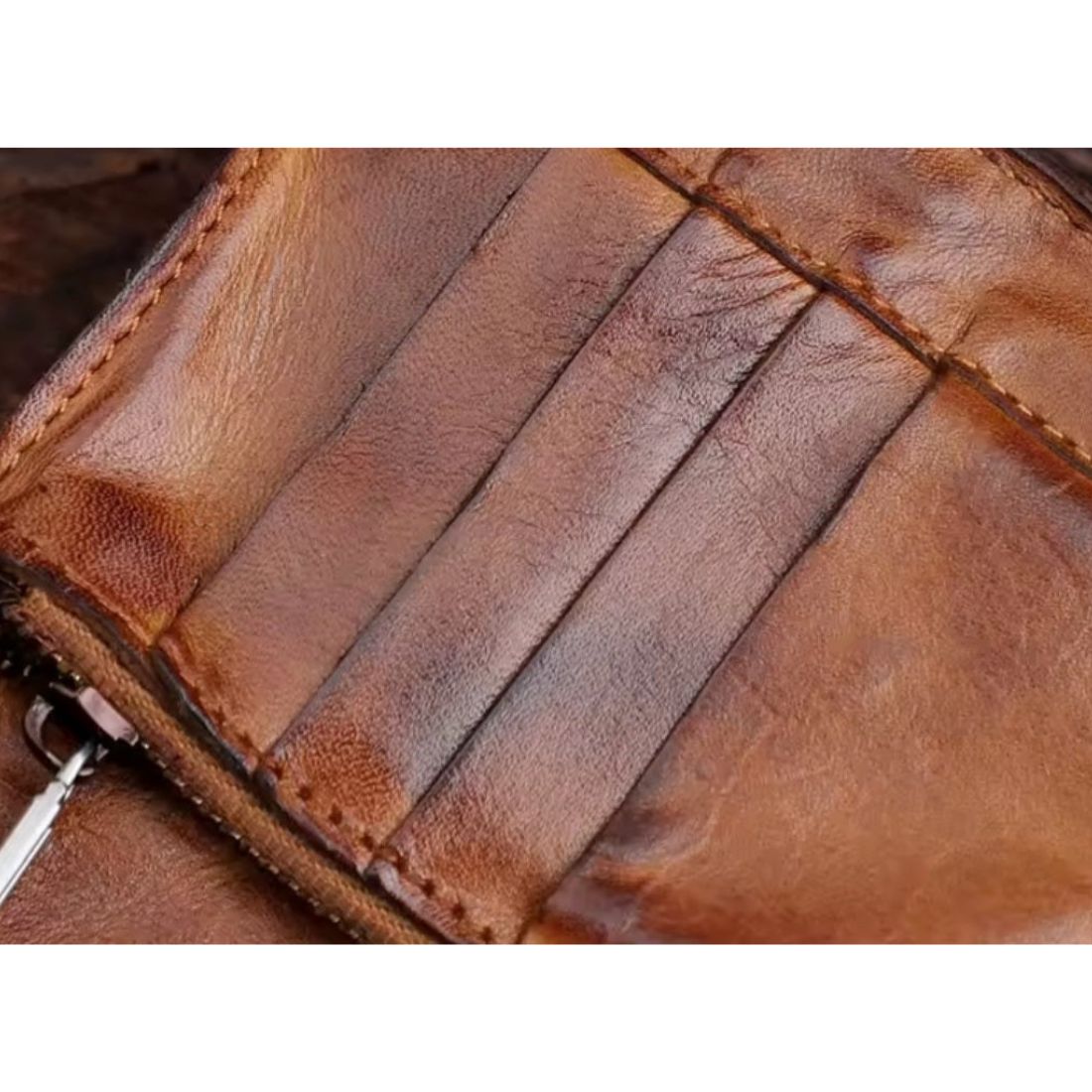 Creased Heritage Fold luxury vintage genuine leather wallet in brown showing precision stitching and organized card holders