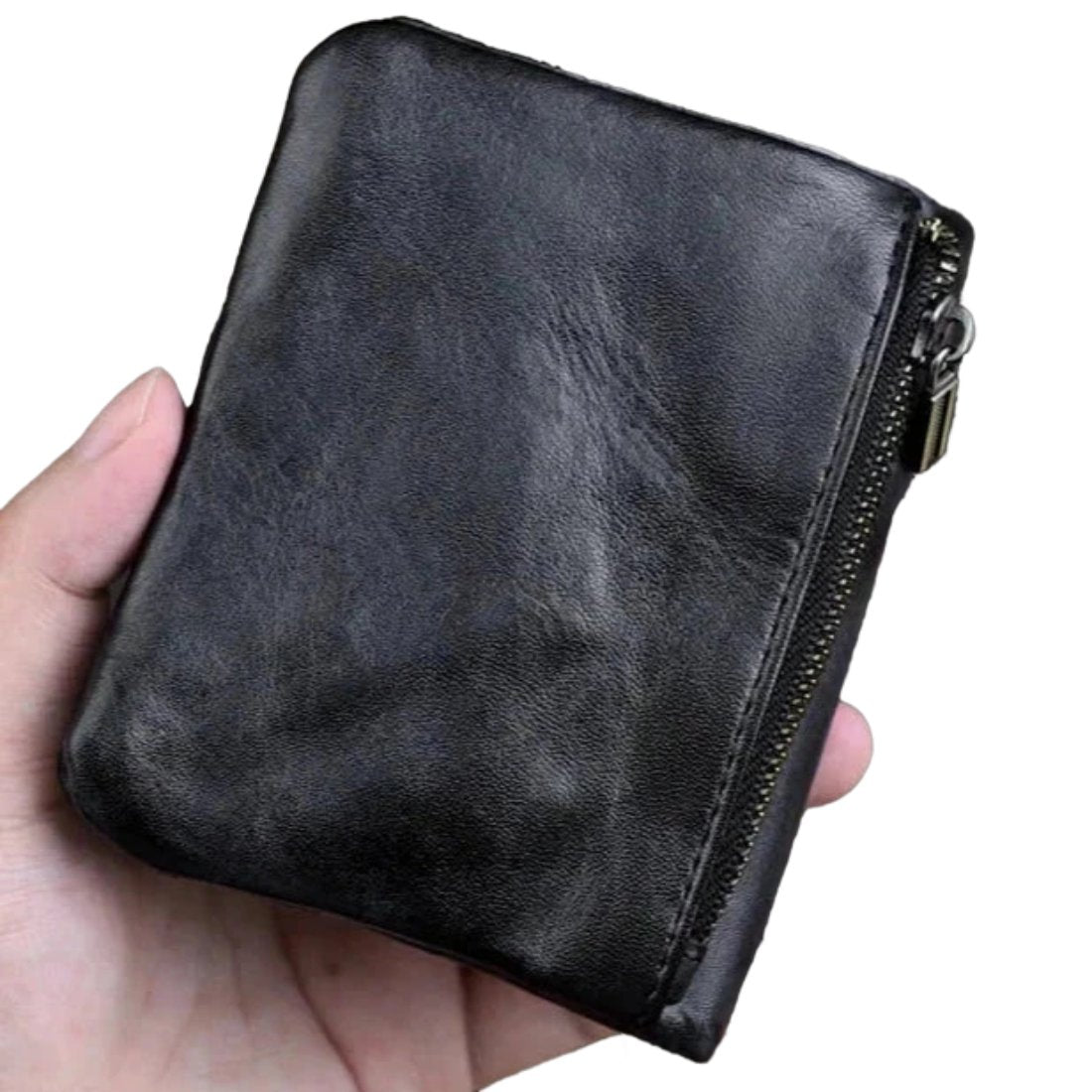Creased Heritage Compact Fold luxury wallet in black premium leather upscale compact fold held in hand