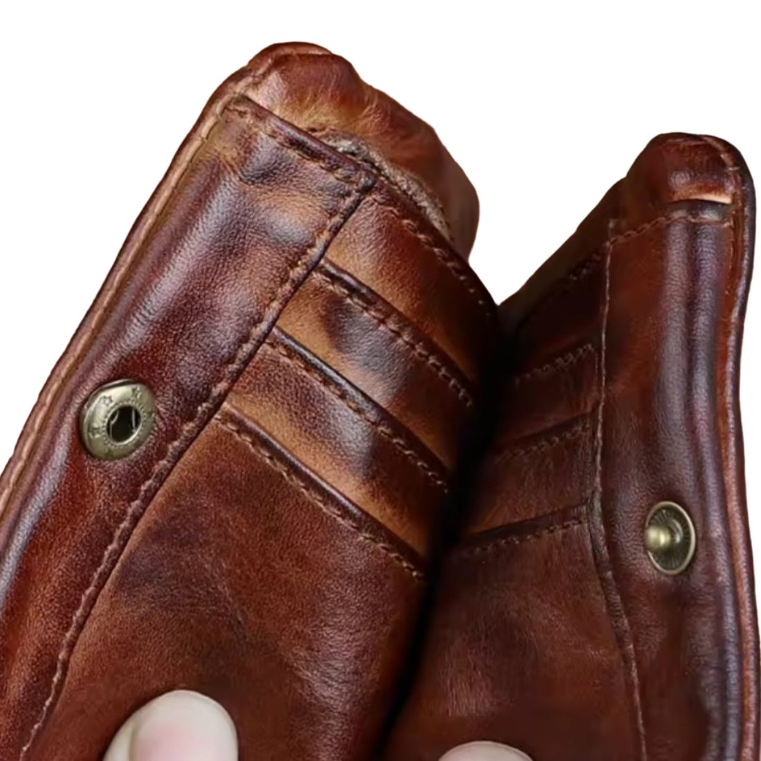 Creased Heritage Compact Fold luxury wallet in brown leather close up of snap closure