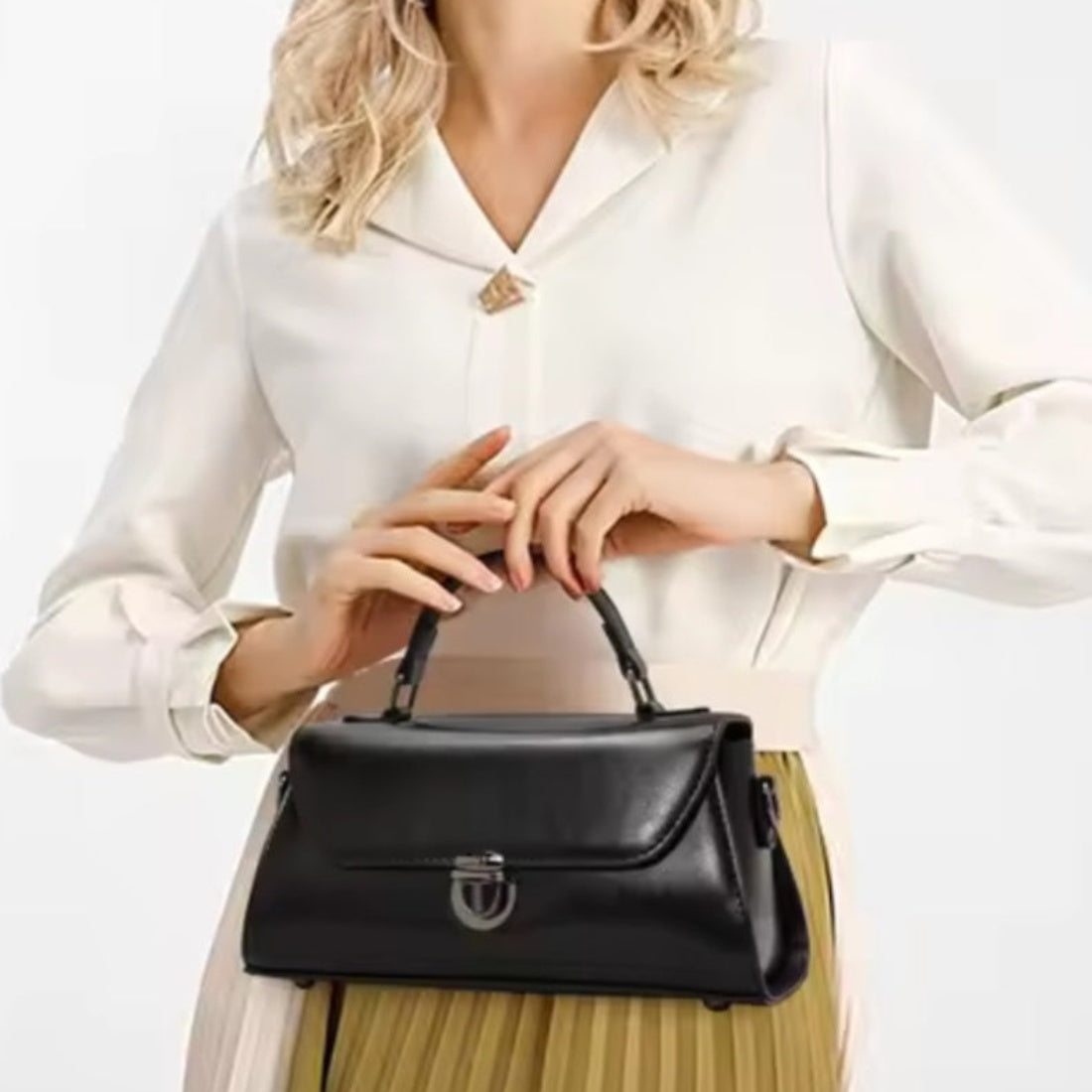 Metro Fold Carry luxury genuine leather compact black handbag styled with casual outfit