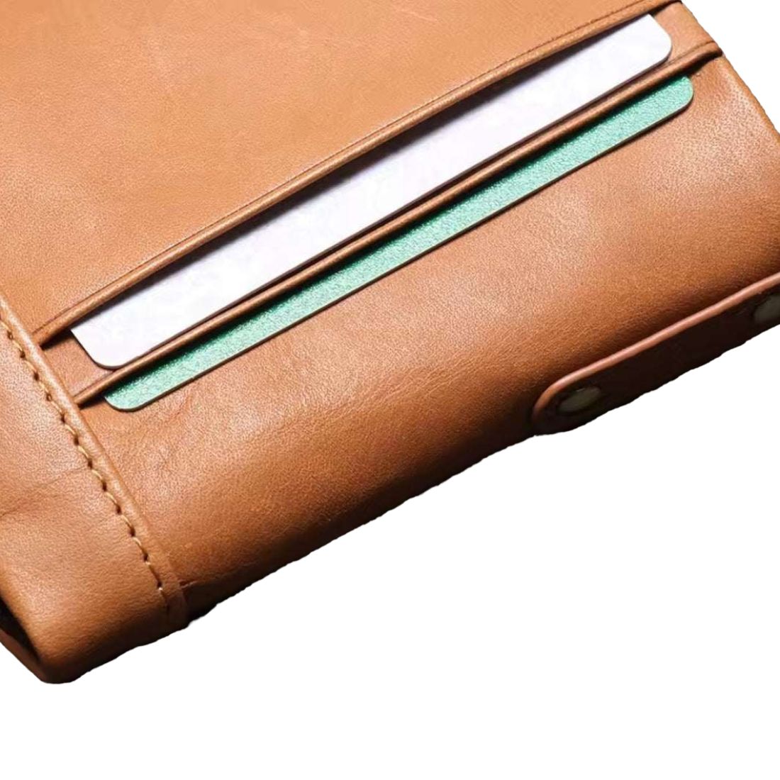 Heritage Fold luxury wallet in brown retro oil wax genuine leather showing corner section with two card slots partially filled visible stitching and snap button closure showcasing premium smart interior layout upscale detailing and practical everyday durable luxury utility