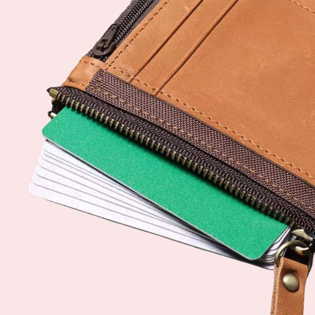 Heritage Fold luxury wallet in brown retro oil wax genuine leather partially unzipped revealing index cards with green divider visible stitching brass zipper pull and fabric edge showcasing secure storage upscale detailing and everyday utility