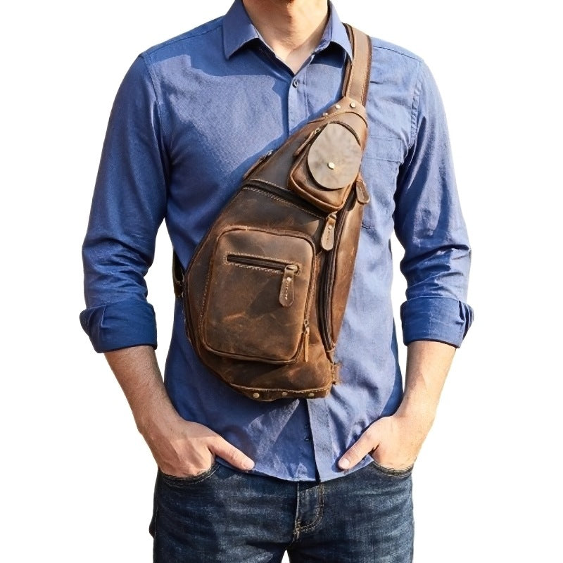 Heritage Nomad Sling men’s crazy horse leather crossbody bag in brown, worn across chest